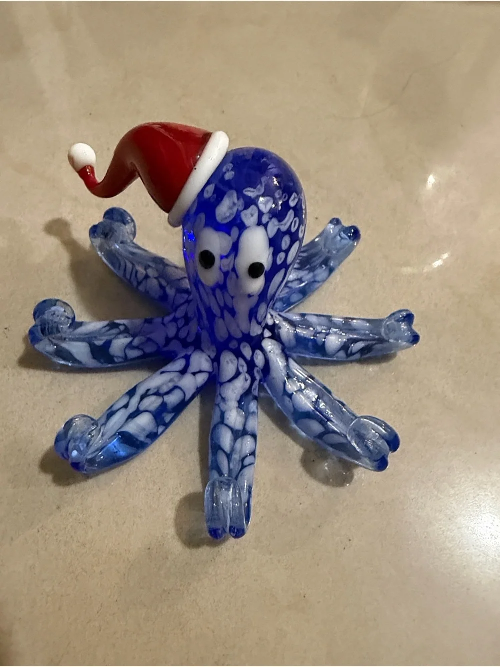 Pier 1 Blue and White Glass Octopus with Red Santa Hat
